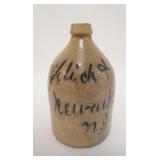 1006	BLUE SCRIPT JUG FROEHLIC & KOEHLER, NEWARK NJ, HAS A SMALL RIM CHIP, 11 1/2 IN HIGH