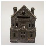 1010	BUILDING STILL BANK, 2 CHIMNEYS, CAST IRON, 3 1/4 IN WIDE X 4 1/2 IN HIGH