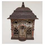 1011	*BANK* STILL BANK, RED & WHITE DECORATION, CAST IRON, 4 1/2 IN WIDE X 6 1/8 IN HIGH
