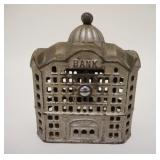 1012	*BANK* STILL BANK, SILVER DECORATION, CAST IRON, 4 IN WIDE X 5 IN HIGH