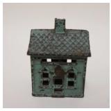 1014	SMALL HOUSE BANK, TURQUOISE DECORATION, CAST IRON, 2 1/4 IN WIDE X 2 7/8 IN HIGH