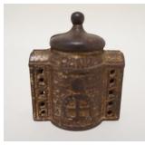 1015	*BANK* STILL BANK, CAST IRON, 2 3/4 IN WIDE X 3 1/4 IN HIGH