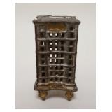 1016	*BANK* STILL BANK, CAST IRON, 1 3/4 IN WIDE X 3 5/8 IN HIGH