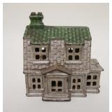 1017	HOUSE STILL BANK, GREEN & SILVER DECORATION, CAST IRON, 3 7/8 IN WIDE X 4 1/8 IN HIGH