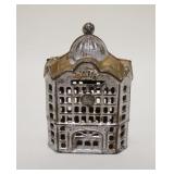 1018	*BANK* STILL BANK, GOLD & SILVER DECORATION , CAST IRON, 3 1/8 IN WIDE X 4 3/4 IN HIGH