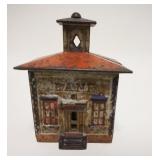 1024	*BANK* STILL BANK W/RED & BLACK DECORATION, 3 3/8 IN WIDE X 4 1/4 IN HIGH