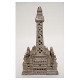 1037	ALUMINUM STILL BANK W/TOWER, 4 3/8 IN WIDE X 7 1/8 IN HIGH