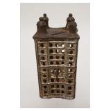 1038	BUILDING STILL BANK, CAST IRON, 2 1/4 IN SQUARE X 4 1/2 IN HIGH