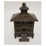 1042	BRASS *CAISSE* STILL BANK, STAIRS EXTEND IN FRONT OF THE BUILDING, 3 5/8 IN WIDE X 5 1/4 IN HIG