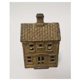 1044	SMALL HOUSE STILL BANK, CAST IRON, 2 1/4 IN WIDE X 3 1/8 IN HIGH