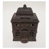 1046	*BANK* BUILDING STILL BANK, CAST IRON, 3 3/4 IN WIDE X 5 1/2 IN HIGH