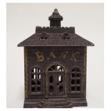 1052	*BANK* STILL BANK, CAST IRON, 4 1/4 IN WIDE X 5 5/8 IN HIGH