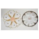 1072	2 HAND PAINTED OYSTER PLATES, ONE HAS A RAISED STAR ON THE BASE-9 1/2 IN, OTHER IS MARKED LIMOG