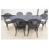 1085	7 PIECE CAST METAL PATIO SET, TABLE IS 72 IN X 48 IN, 6 ARM CHAIRS, INCLUDES UMBRELLA HOLDER