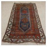 1108	ORIENTAL AREA RUG, WORN, 4 FT X 7 FT 1 IN
