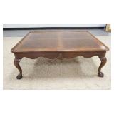 1124	HENREDON COCKTAIL TABLE W/BALL & CLAW FEET & SHELL CARVED SKIRT, HAS FINISH WEAR ON THE EDGES &