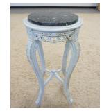 1135	CARVED STAND W/INSET DARK MARBLE TOP PAINTED WHITE, 15 1/2 IN DIAMETER X 29 1/4 IN HIGH