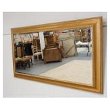 1143	LARGE BEVELED MIRROR IN GILT FRAME, 69 IN X 36 1/2 IN OVERALL