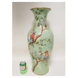 1219	LARGE VASE DECORATED W/MONKEYS WEARING HUMAN CLOTHING, 25 IN HIGH