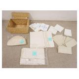 1228	BASKET OF LINENS, LARGE TABLCLOTH W/MATCHING NAPKINS IS 102 IN X 64 IN