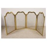 1236	SMALL BRASS FIRPLACE SCREEN, 4 PART, 21 3/4 IN HIGH, EACH SECTION IS 12 3/4 IN WIDE