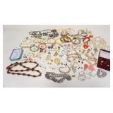 1243	LOT OF COSTUME JEWELRY