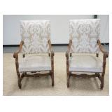 1253	PAIR OF CARVED HIGH BACK UPHOLSTERED CHAIRS W/CARVED STRETCHERS, 25 1/2 IN WIDE X 47 IN HIGH