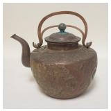 1294	EMBOSSED COPPER TEAPOT, IMPRESSED CHINA ON THE BASE