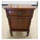 1010	3 DRAWER CHERRY NIGHTSAND TURNED 3/4 COLUMNS & TURNED FEET. 18 IN W, 13 IN DEEP, 27 IN H 