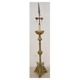 1029	TALL ORNATE BRASS LAMP W/ CLAW FEET. 45 3/4 IN H 