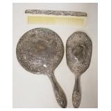 1030	3 PIECE SILVERPLATED DRESSER SET MIRROR IS 9 1/4 IN 