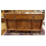 1031	EMPIRE SIDEBOARD W/ FULL COLUMN FRONT & TURNED FEET TWO PULL OUT SURFACES ON THE SIDES, TOP IS 