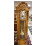 1046	HOWARD MILLER OAK TALL CASE CLOCK, NO. 150-H WESTMINSTER CHIME MODEL 610-160 77 1/2 IN HIGH 