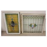 1063	2 STAINED GLASS WINDOWS, ONE WITH PURPLE CENTER HAS CRACKS. 32 3/4 IN X 35 3/4 IN OTHER IS 36 I