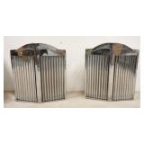 1073	PAIR OF CHROME DECORATIVE ACCESSORIES IN THE FORM OF A GRILL. 24 IN W, 27 1/2 IN H, 8 IN DEEP