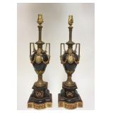 1094	PAIR OF SLATE & METAL LAMPS W/ CHERUB MEDALLIONS & FLORAL SWAGS CORDS CUT. 27 1/2 IN H SIGNED H