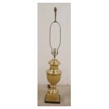 1097	HAND CRAFTED SOLID BRASS LAMP ON A WOODEN BASE. 38 IN H 