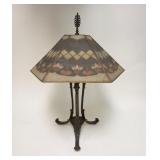 1112	CAST IRON LAMP W/DECORATED PIERCED TIN SHADE, 27 1/2 IN HIGH