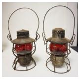 1215	2 PENNSYLVANIA RAILROAD LANTERNS MARKED METAL & GLASS, RED GLOBES