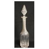 1221	ANTIQUE RIBBED & SWIRLED DECANTER W/ ORIGINAL MATCHING HOLLOW BLOWN STOPPER. CHIP ON THE SHANK 
