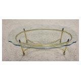 1229	ORNATE BRASS COFFEE TABLE W/SCALLOPED EDGE GLASS TOP, 16 IN HIGH X 47 IN WIDE X 27 IN DEEP