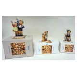 1304	3 GOEBEL HUMMELS W/ BOXES LARGEST IS 7 IN H