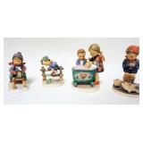 1306	LOT OF 4 HUMMELS LARGEST IS 5 1/2 IN H 