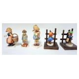 1308	LOT OF 5 GOEBEL HUMMELS LARGEST IS 6 1/2 IN H