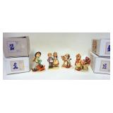 1311	LOT OF 4 GOEBEL HUMMELS W/ BOXES TALLEST IS 5 1/4 IN H 