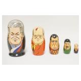 1319	5 PART RUSSIAN NOVELTY NESTING DOLLS OF RUSSIAN POLITICIANS. 6 1/2 IN H 