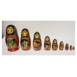 1320	10 PART RUSSIAN NESTING DOLLS 2ND LARGEST HAS CRACK. 9 3/4 IN H 