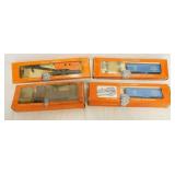 1190	LOT OF 4 HO BY LIONEL MODEL TRAINS/ACCESSORIES, NO. 0889 WRECKER CRANE CAR, NO 0357 COP & HOBO 