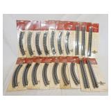 1266	LARGE LOT OF LEMAX MODEL TRAIN TRACKS INCLUDES BOTH CURVED & STRAIGHT TRACKS