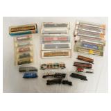 1296	LOT OF N GAUGE MODEL TRAINS INCLUDES, AURORA, MRC, CON-COR, LIFE LIKE, ARNOLD RAPIDO, & ATLAS 